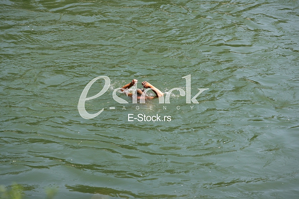 Dynamic Photo Of A Man Diving Into The Water For A Swim Dynamic Photo Of A Man Diving Into The Water For A Swim