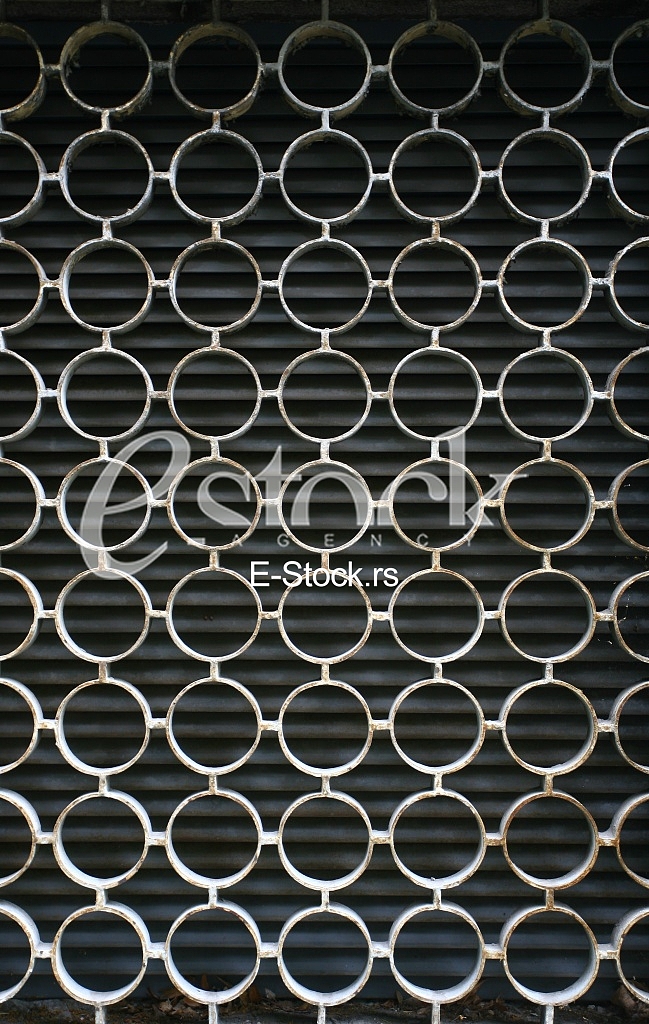 decorative iron window pattern, metal protection on the window, Metal net circle texture background networks with holes decorative iron window pattern, metal protection on the window, Metal net circle texture background networks with holes