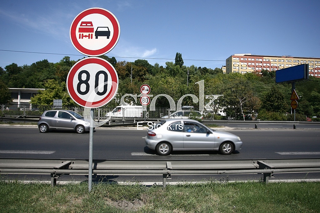 Traffic Sign 80 per hour with no overtaking and traffic on the road Traffic Sign 80 per hour with no overtaking and traffic on the road