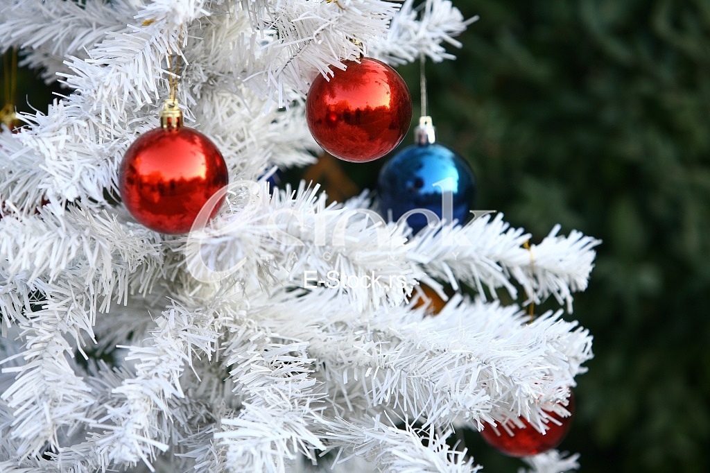 White Christmas tree with colorful ornaments