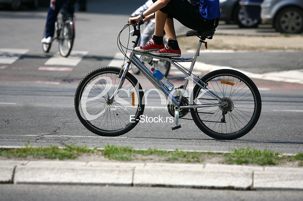 Cyclist riding a bike on an open road