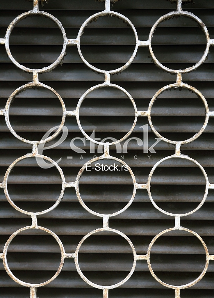 decorative iron window pattern, metal protection on the window, Metal net circle texture background networks with holes decorative iron window pattern, metal protection on the window, Metal net circle texture background networks with holes