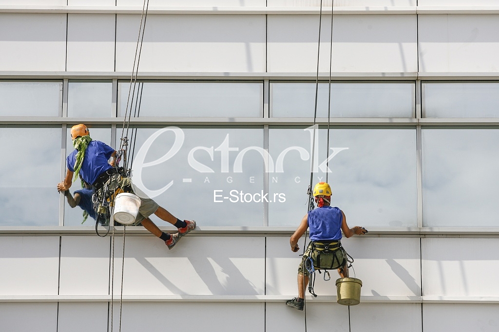 window cleaners on a building