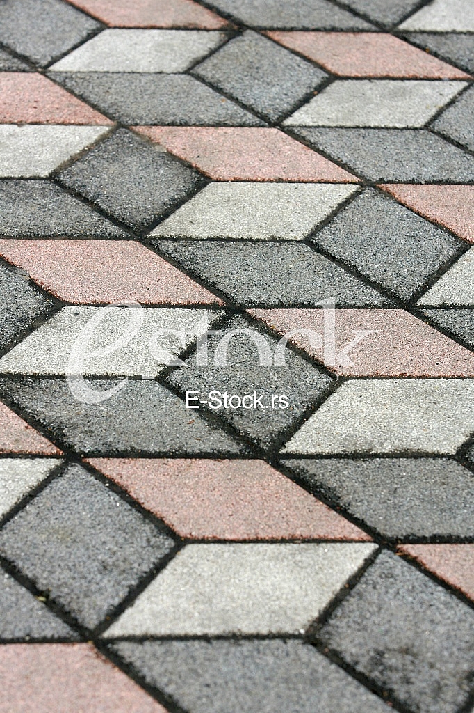 The fragment of a pavement footpath Paving stone with color The fragment of a pavement footpath Paving stone with color