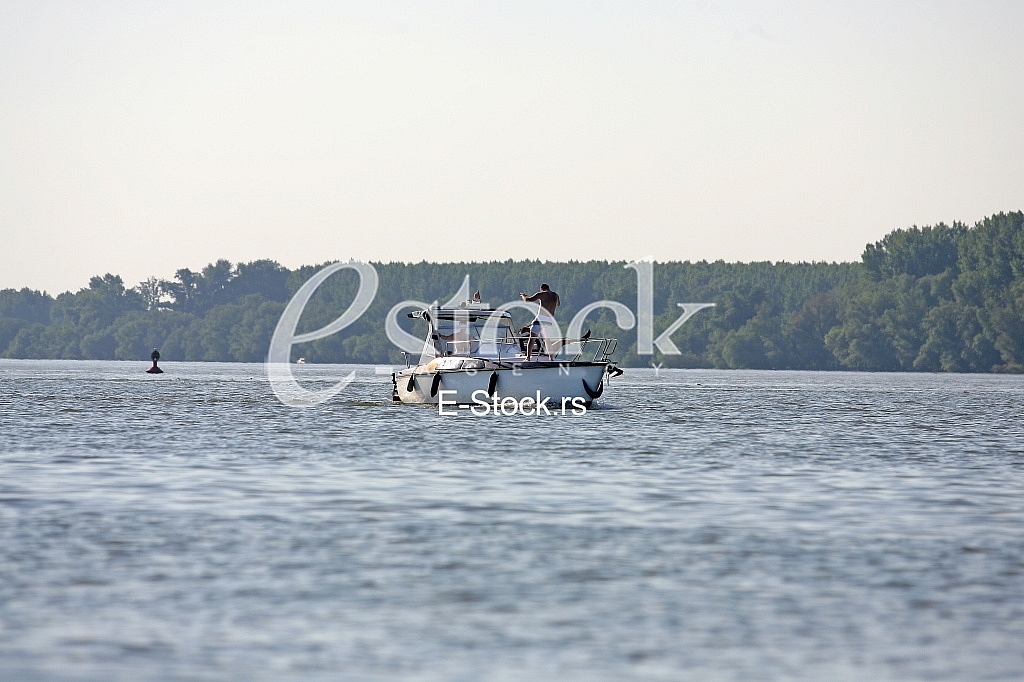 satisfaction of the boat on the Danube river, enjoying on sailboat
