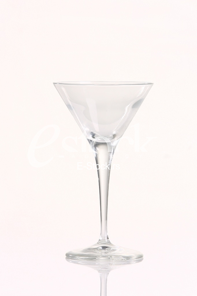 empty martini glass isolated on white
