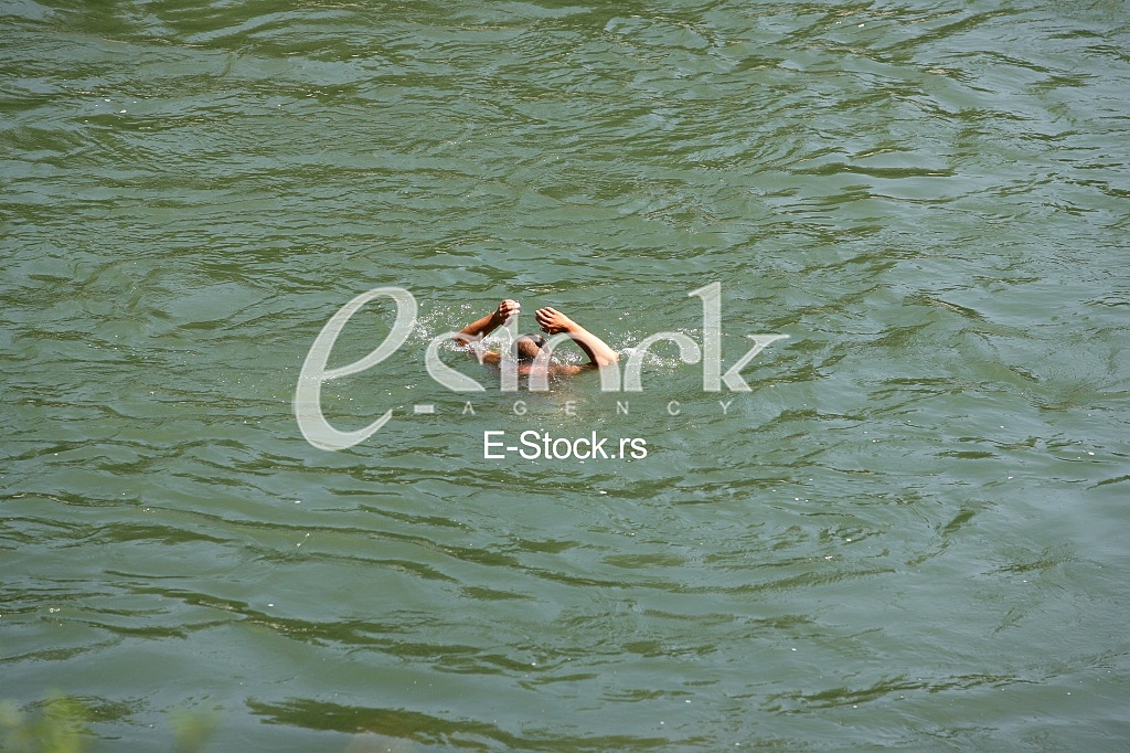 Dynamic Photo Of A Man Diving Into The Water For A Swim