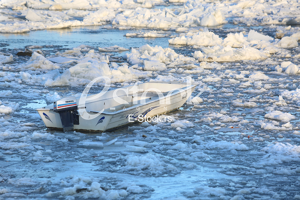 Boat trapped in ice on the Danube river in Zemun near Belgrade