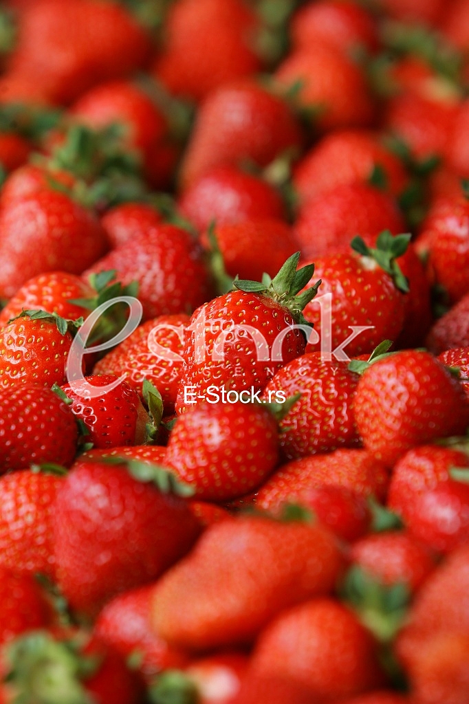Strawberry fresh natural juicy strawberries to background on the street market
