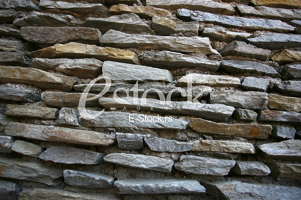 real stone wall surface with cement