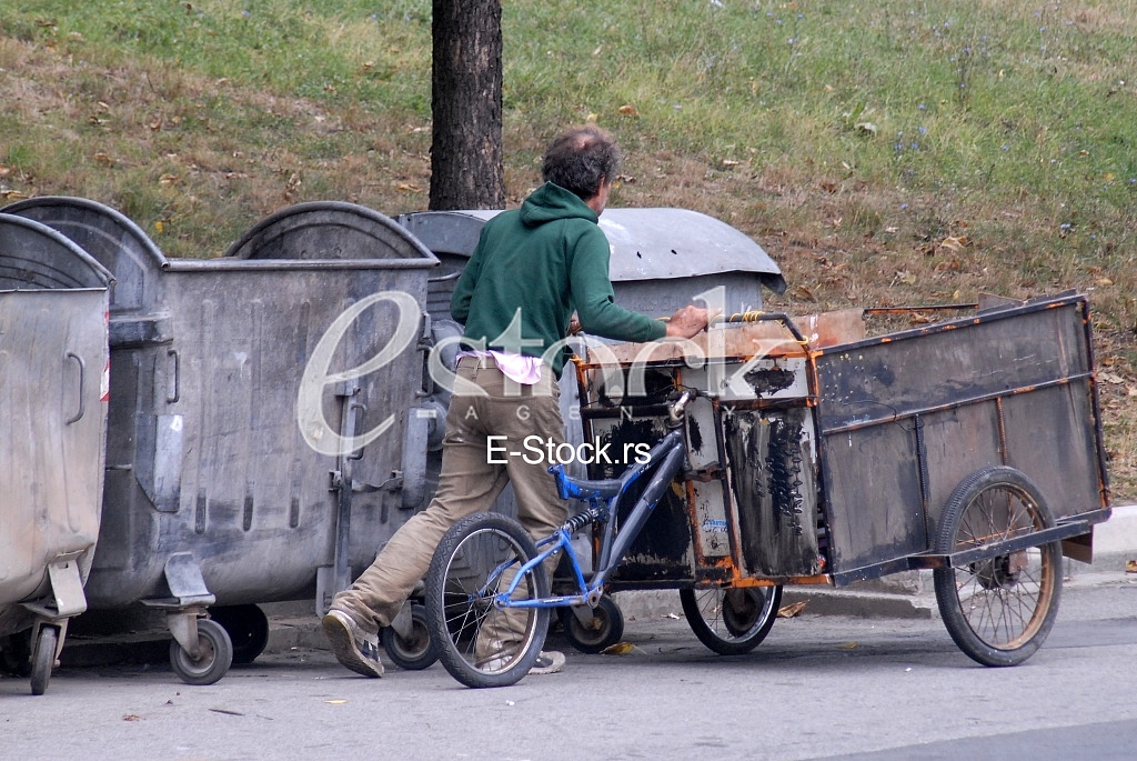 A man collects recyclable materials 