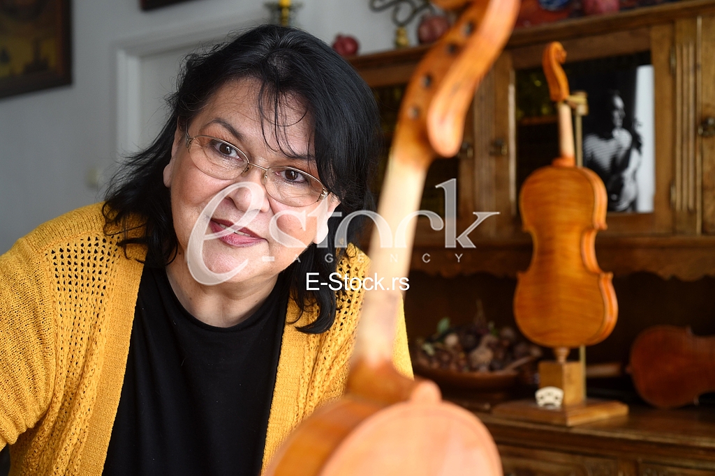 Violin makers, Biljana and Jovan Popovic, Art Workshop Scroll