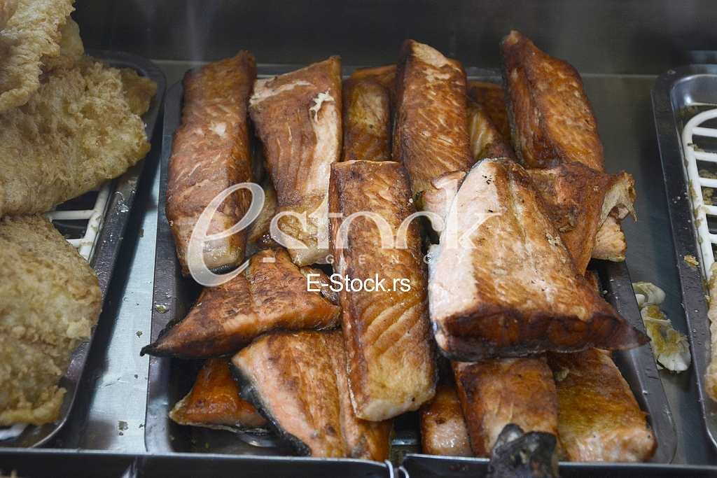 Preparing fish for eating.