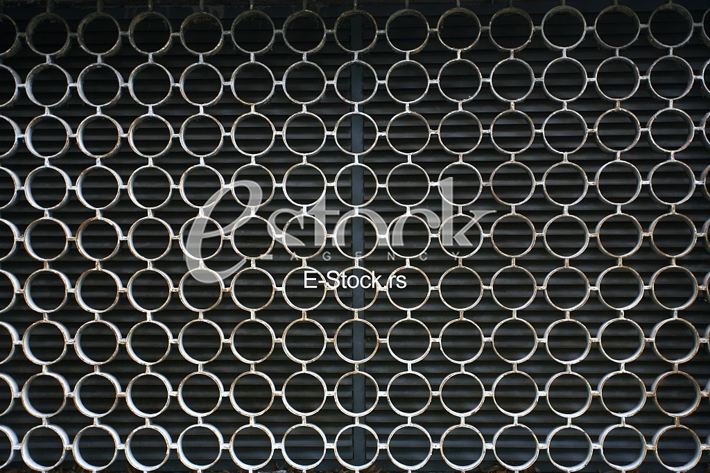 decorative iron window pattern, metal protection on the window, Metal net circle texture background networks with holes