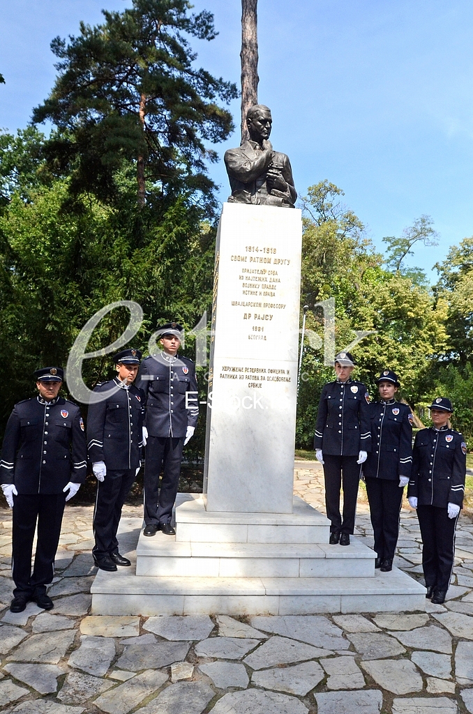 Laying a wreath at the monument to Archibald Reiss