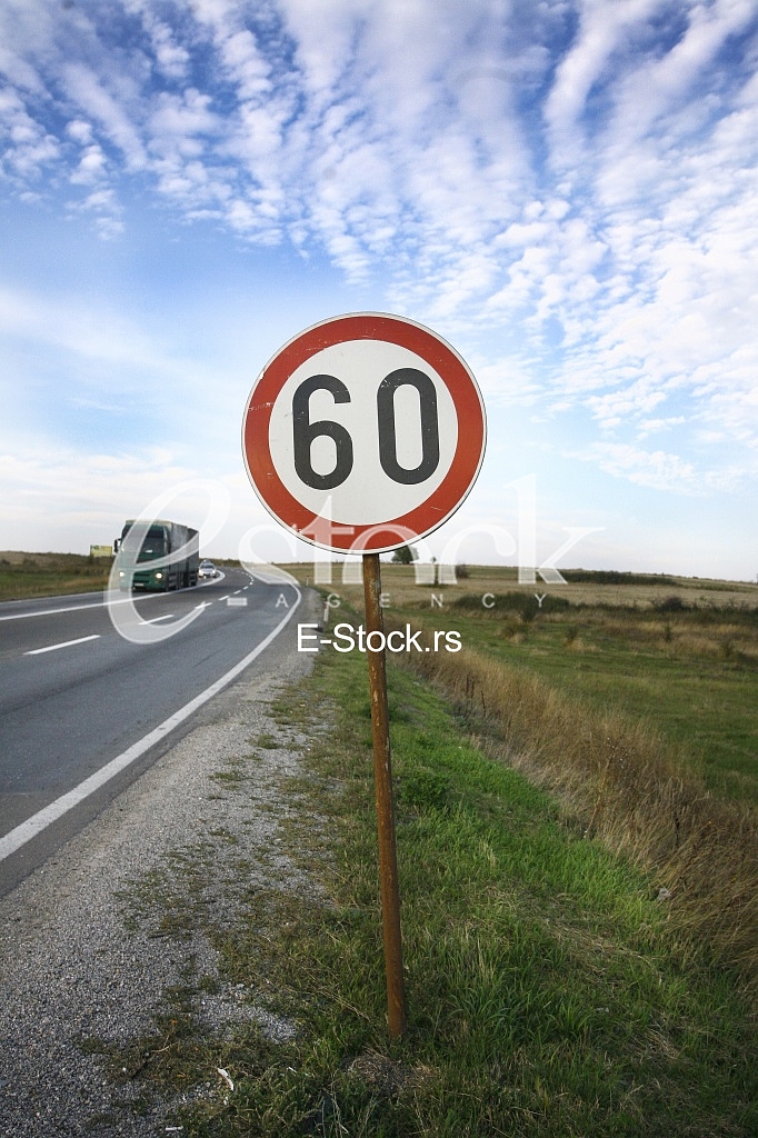 road sing speed limit on sixty