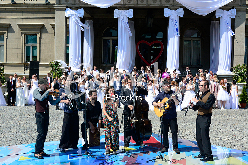 group wedding in front of City Assembly