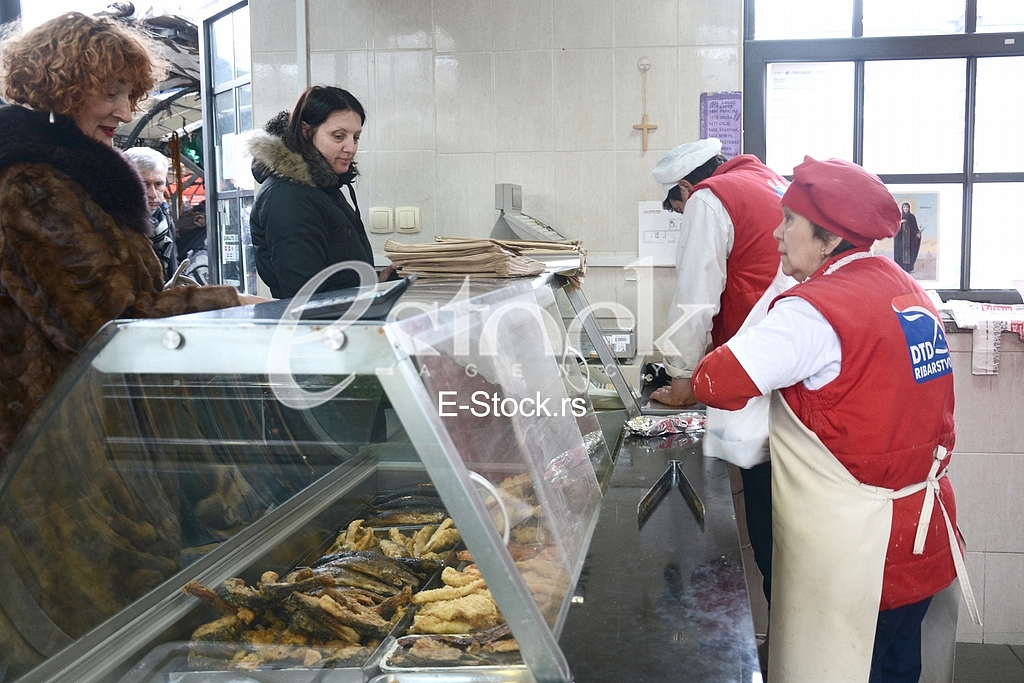 Preparing fish for eating.