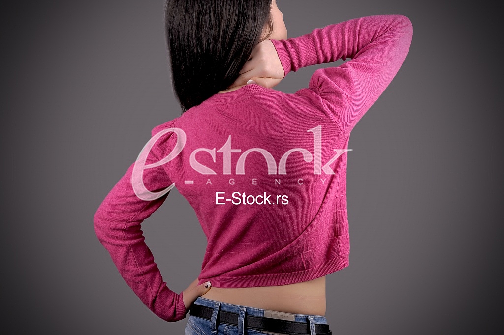 Woman holding back in pain