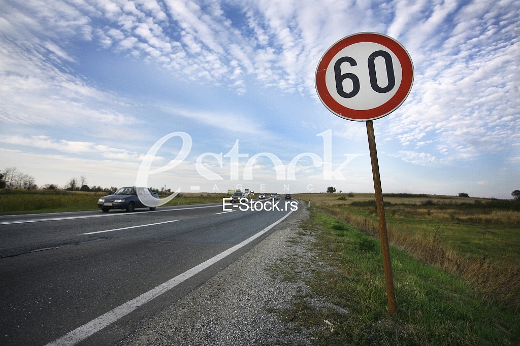 road sing speed limit on sixty