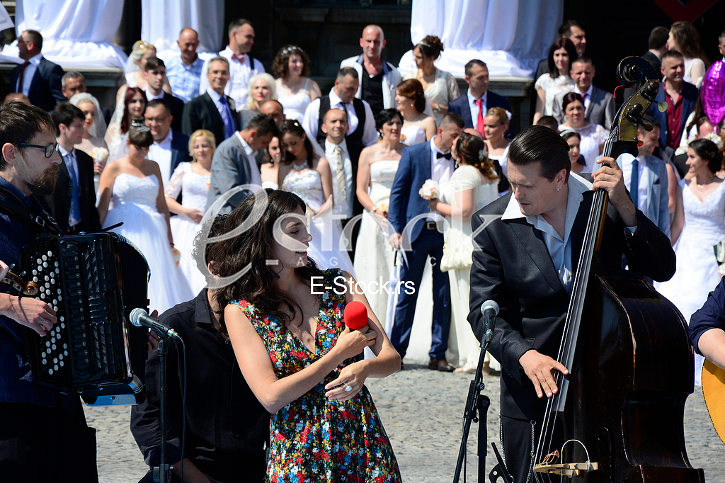 group wedding in front of City Assembly