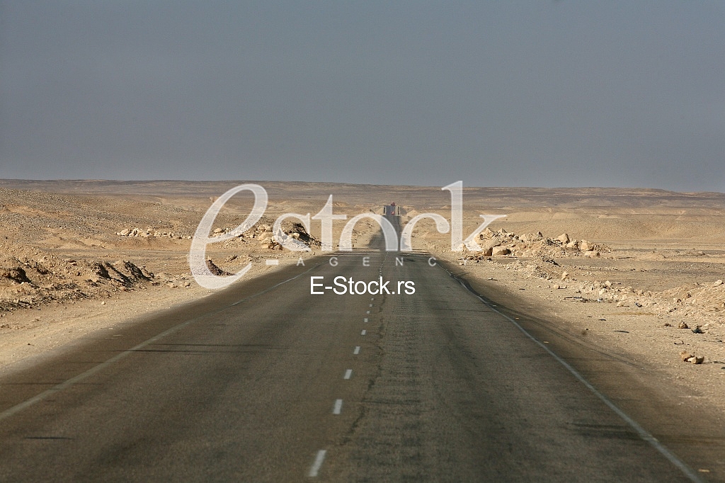 Road through the desert and sandy hills in Egypt