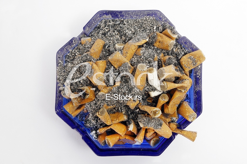 a lot of cigarettes in an ashtray