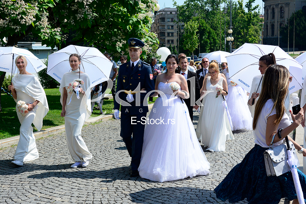 group wedding in front of City Assembly
