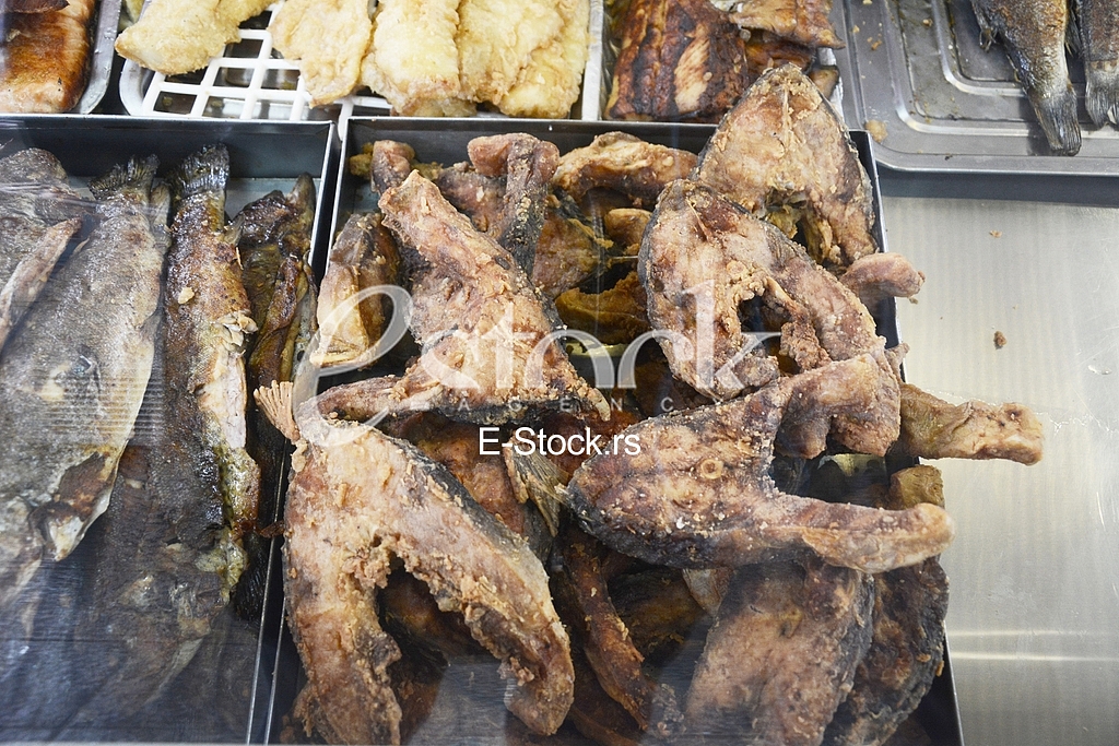 Preparing fish for eating.