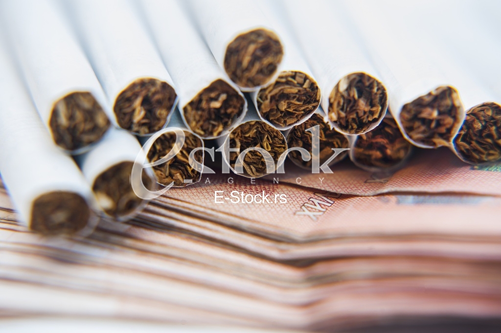 Thousand dinars bills and cigarette