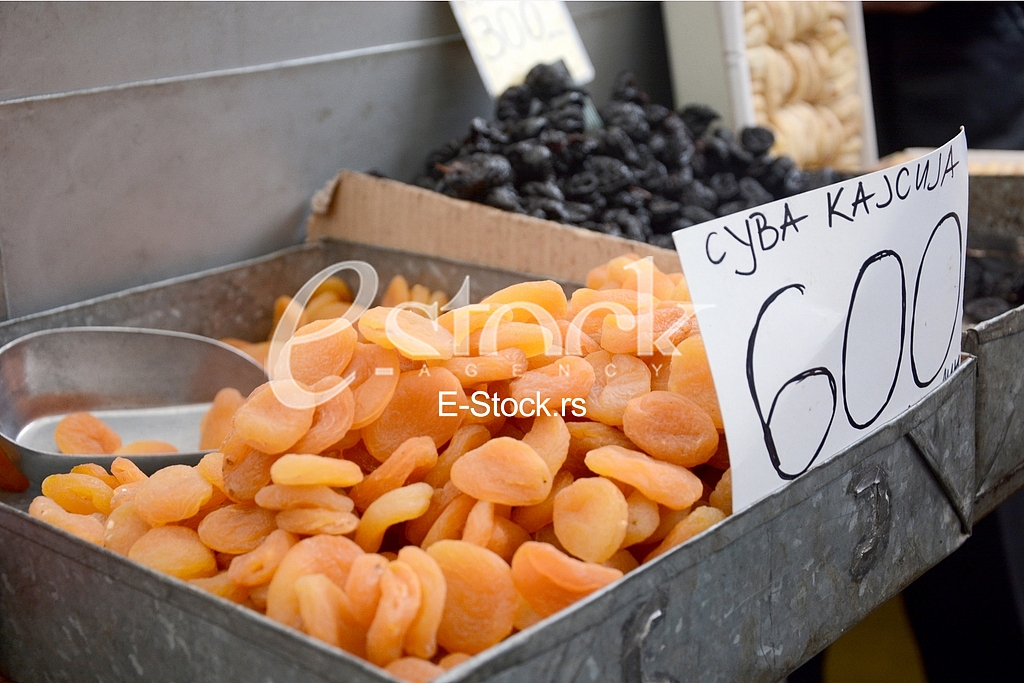 Selling food in the market.