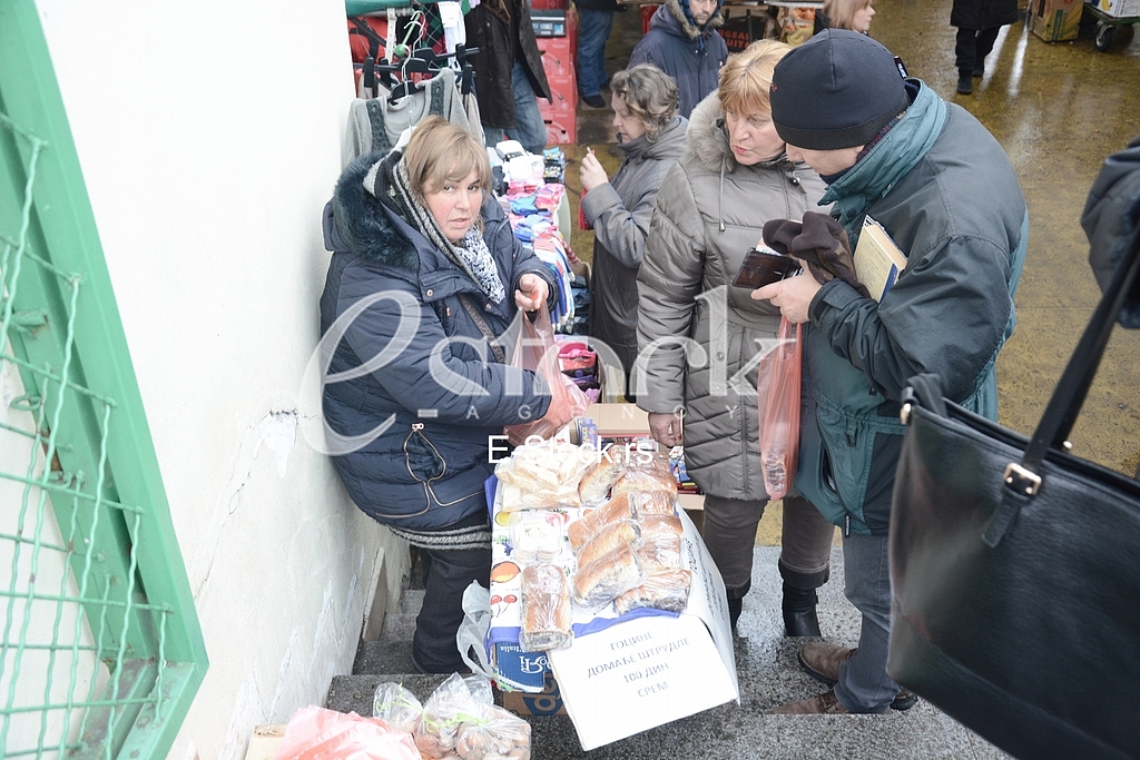 Selling food in the market.