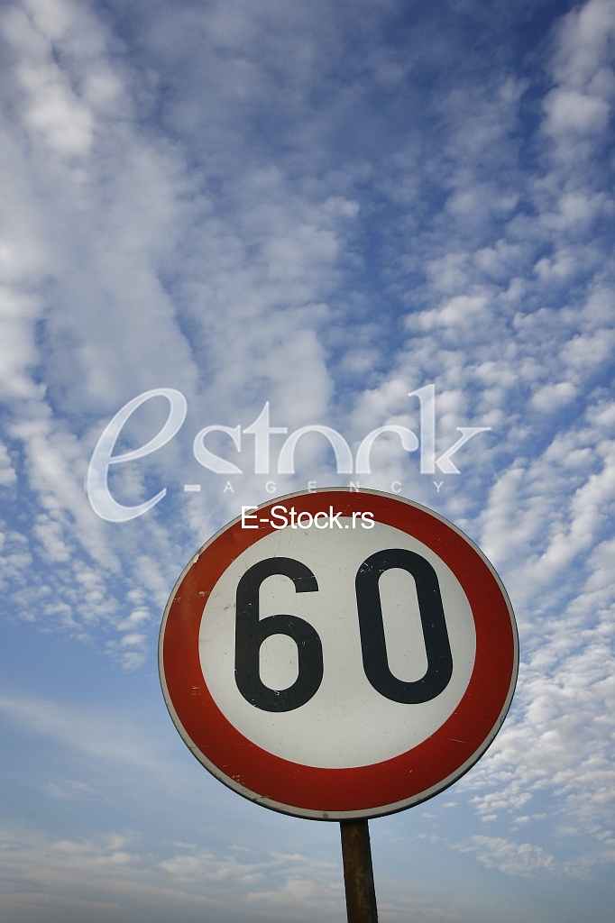 road sing speed limit on sixty