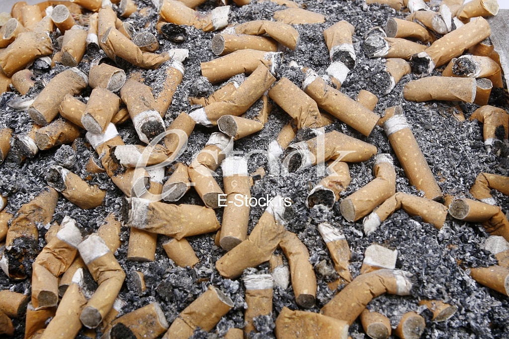 Many smoked cigarette in the crowd of