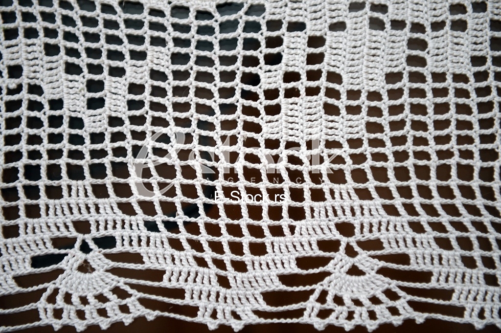 white crochet tablecloth for background