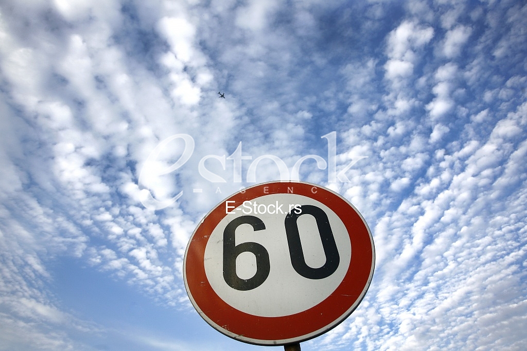 road sing speed limit on sixty