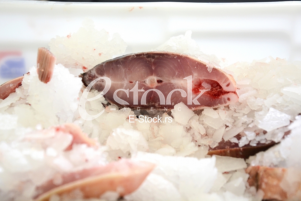 Preparing fish for eating.