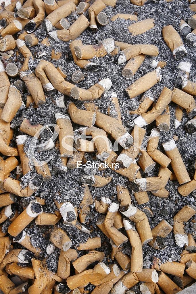 Many smoked cigarette in the crowd of