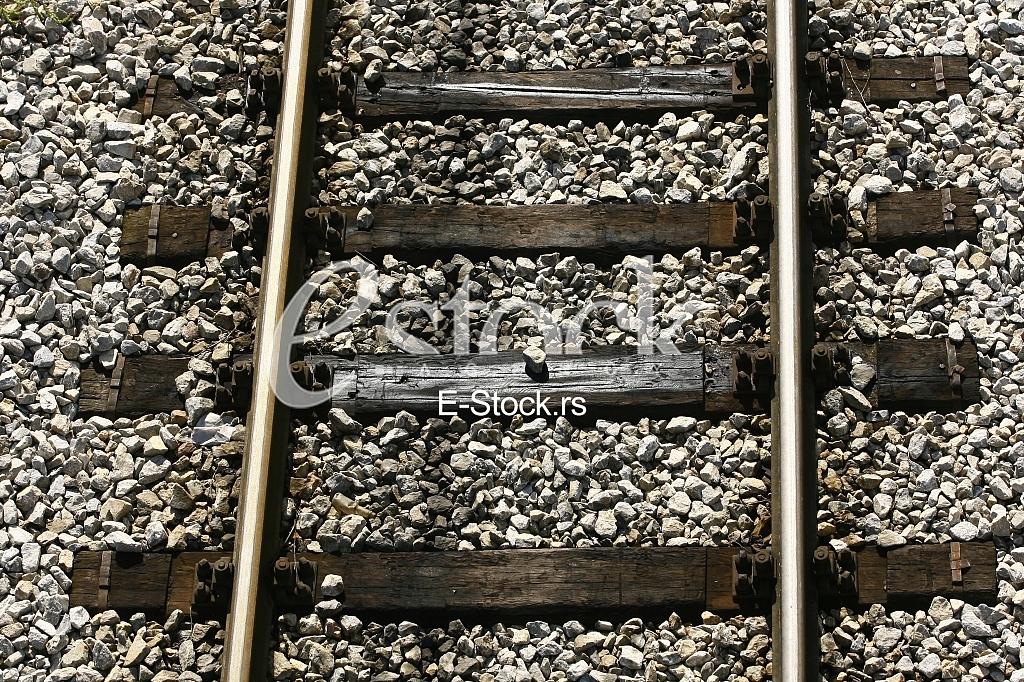 Cargo train platform railway tracks in a rural scene
