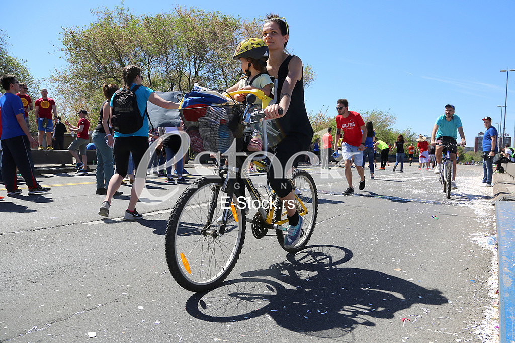 Mom and child on bicycle at 29th Belgrade marathon