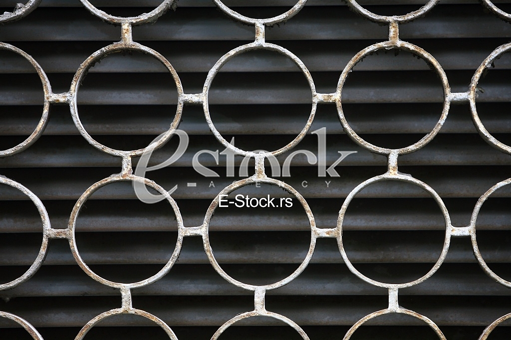 decorative iron window pattern, metal protection on the window, Metal net circle texture background networks with holes