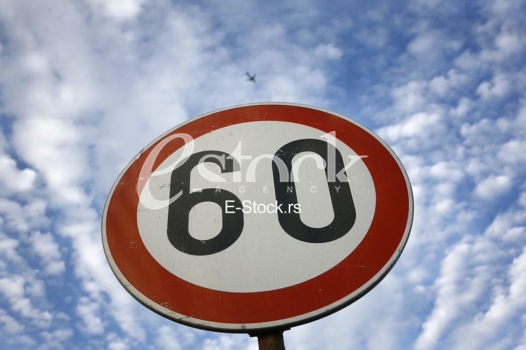 road sing speed limit on sixty