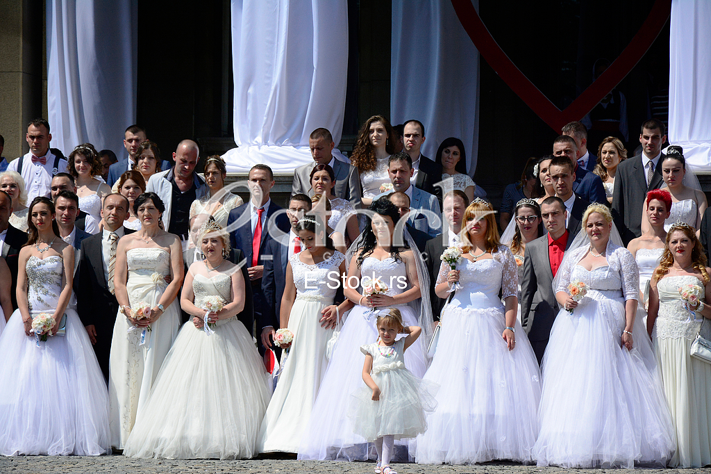 group wedding in front of City Assembly