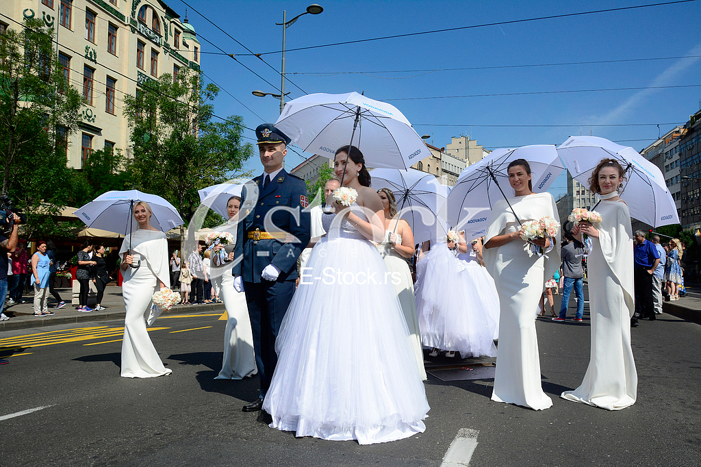 group wedding in front of City Assembly