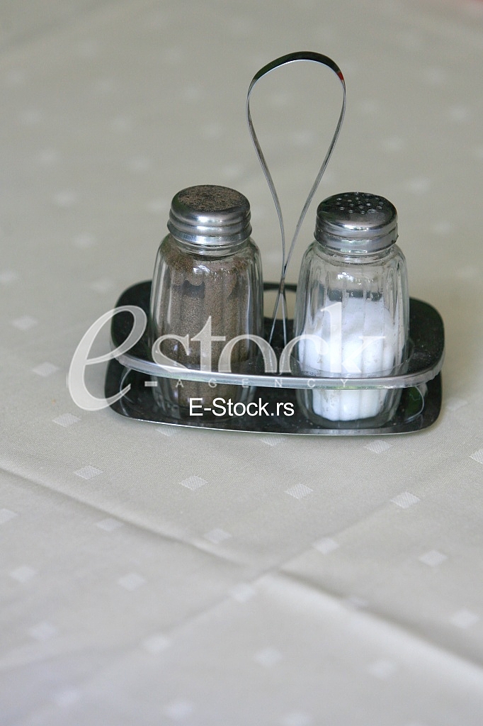 salt and pepper classic shakers on the table