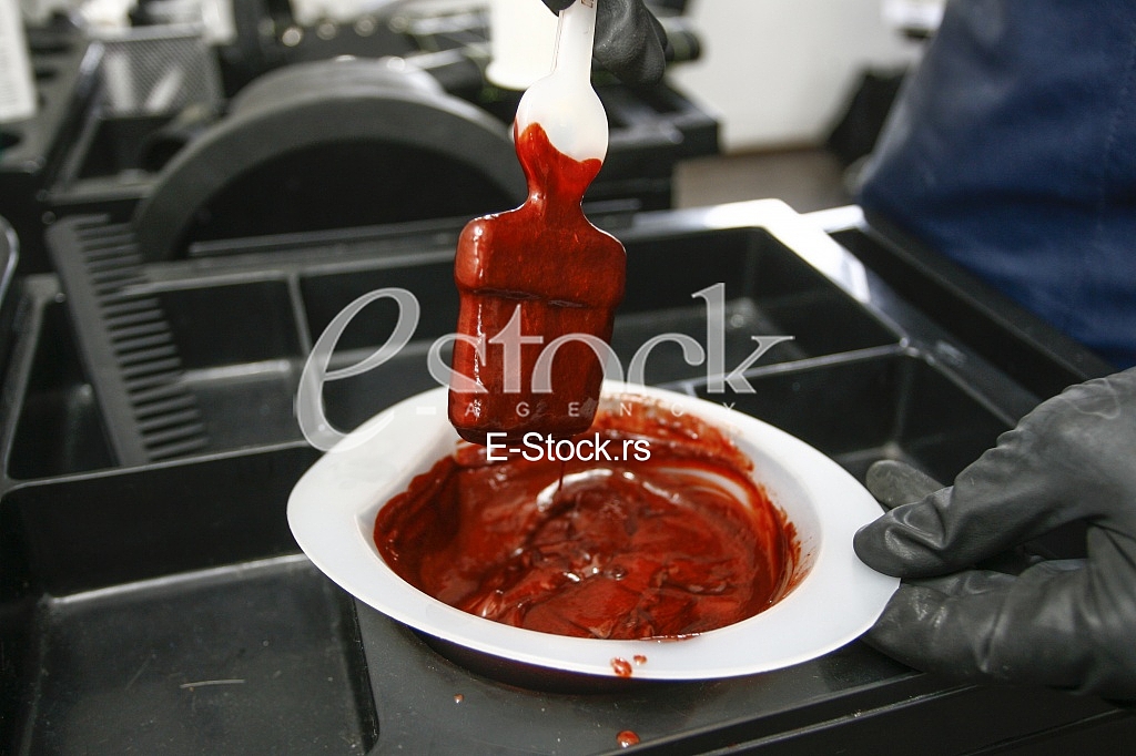 Hairdresser preparing peroxide for hair dyeing treatment