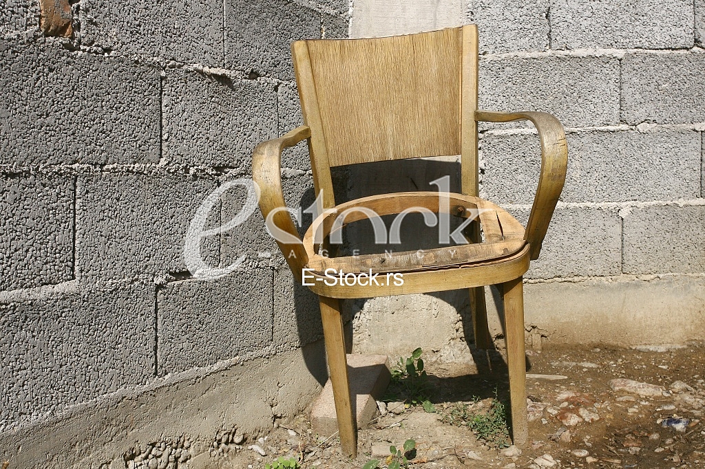 old chair near the old wall