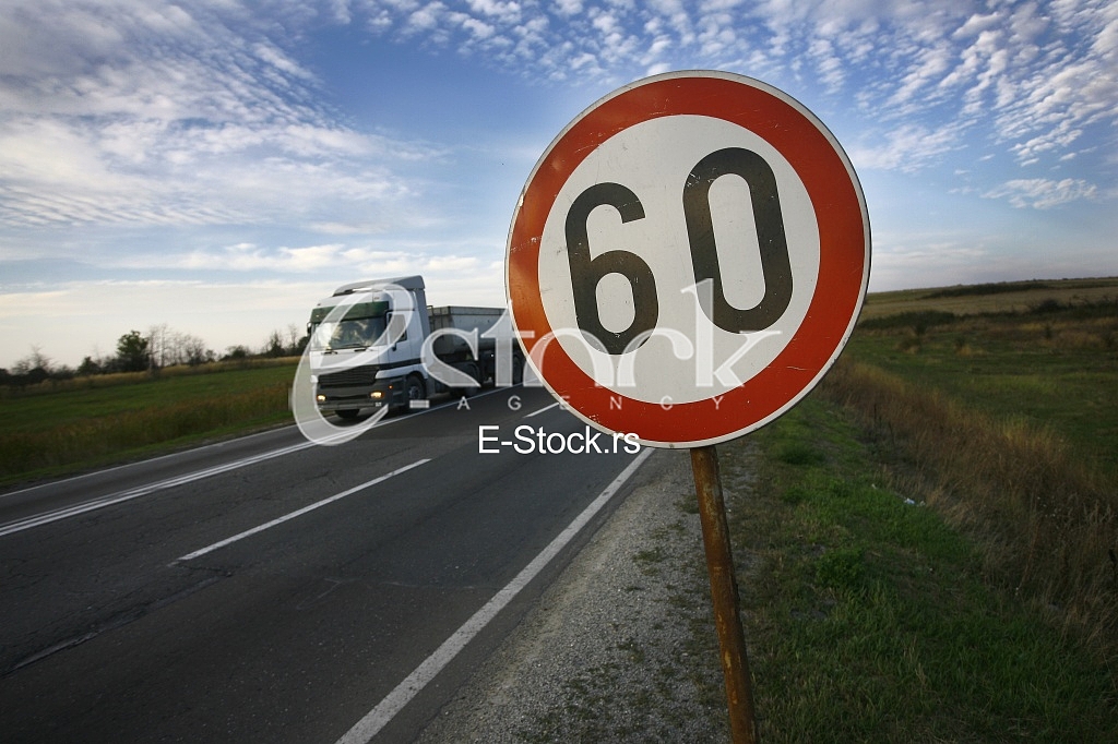road sing speed limit on sixty