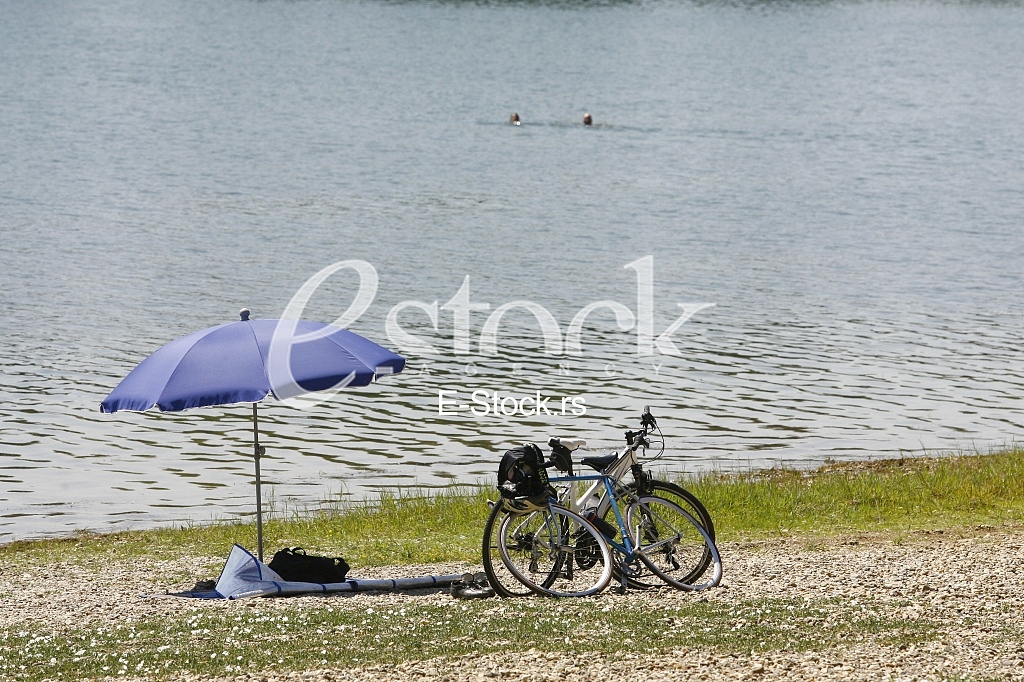 sunshade umbrella on lake Beach