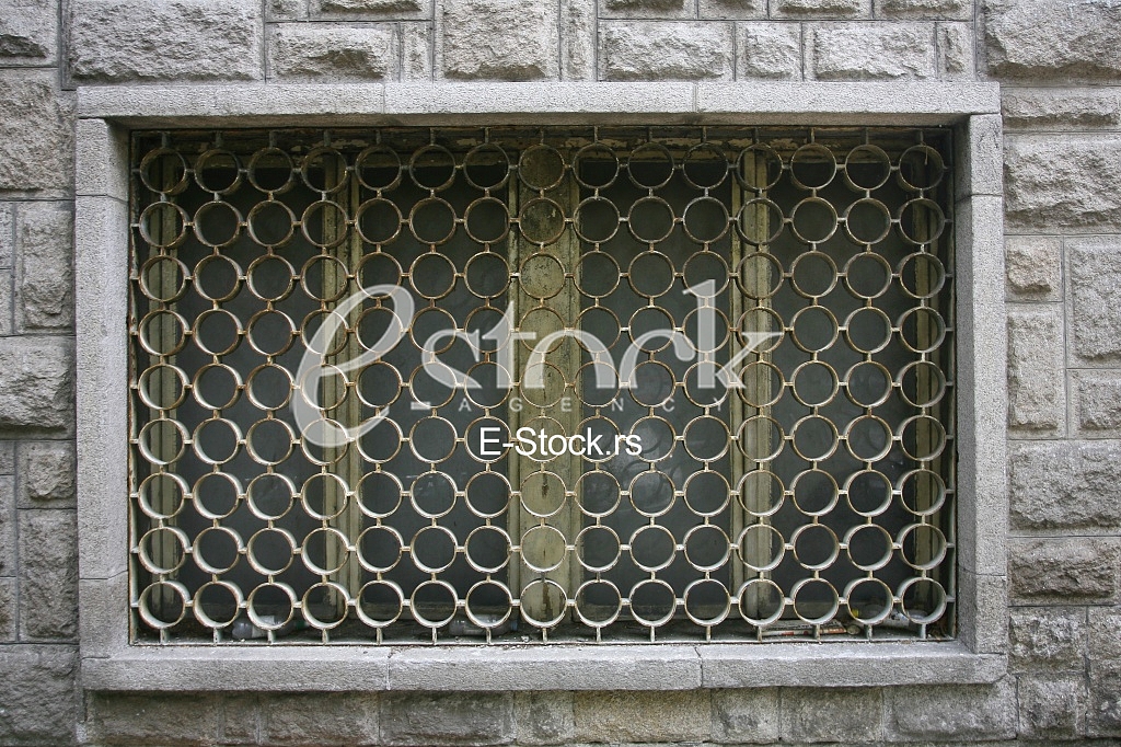 decorative iron window pattern, metal protection on the window, Metal net circle texture background networks with holes